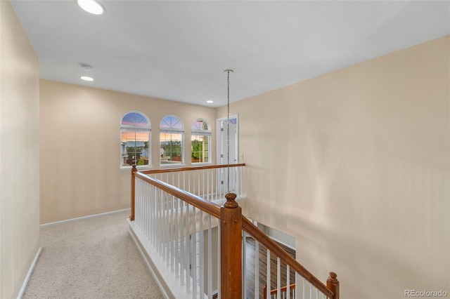 3371 Bexley Dr, Colorado Springs, CO 80922 - hall with an upstairs landing, baseboards, recessed lighting, and carpet floors