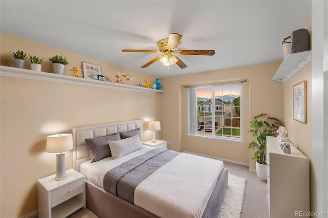 3371 Bexley Dr, Colorado Springs, CO 80922 - bedroom with light colored carpet, baseboards, and ceiling fan