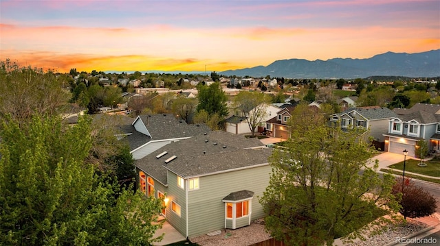 3371 Bexley Dr, Colorado Springs, CO 80922 - aerial view of residential area featuring a mountain backdrop