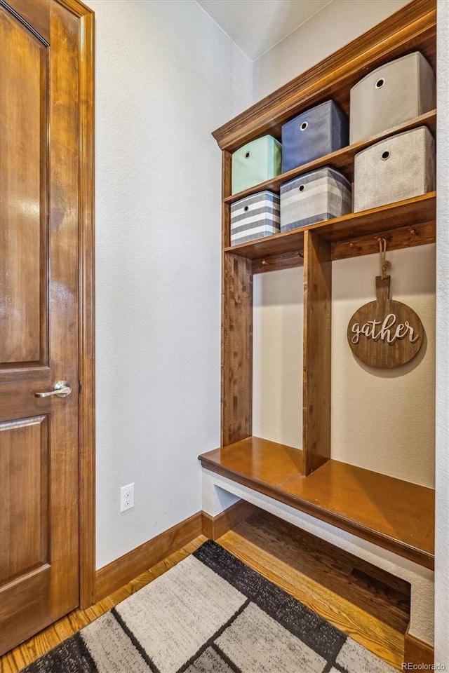 mudroom with hardwood / wood-style floors