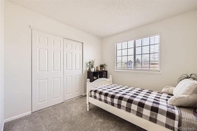 3734 Licorice Trl, Castle Rock, CO 80109 - carpeted bedroom featuring a textured ceiling and a closet