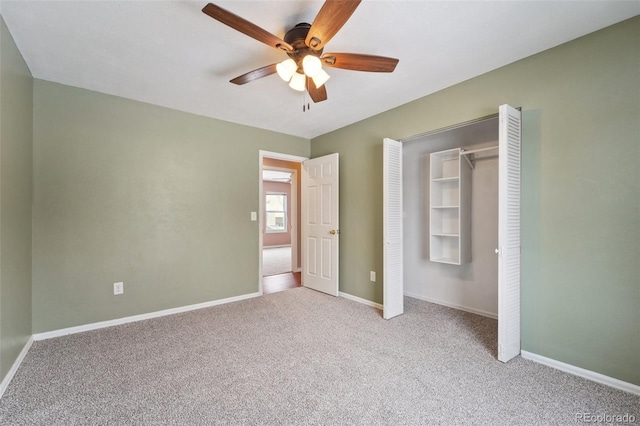 unfurnished bedroom with light colored carpet, ceiling fan, and a closet