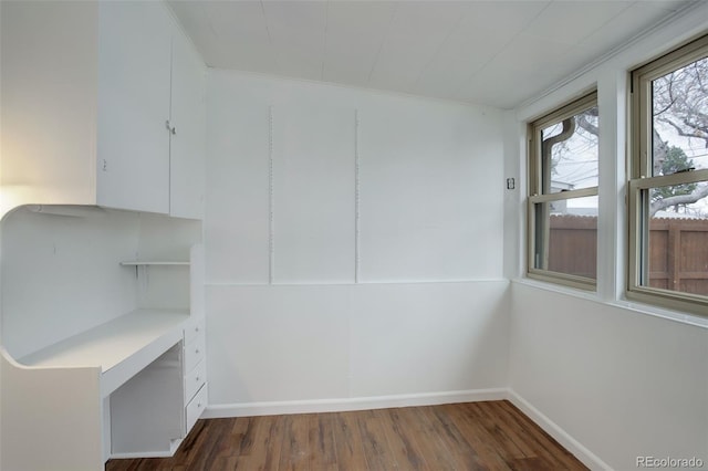 spare room featuring dark hardwood / wood-style floors