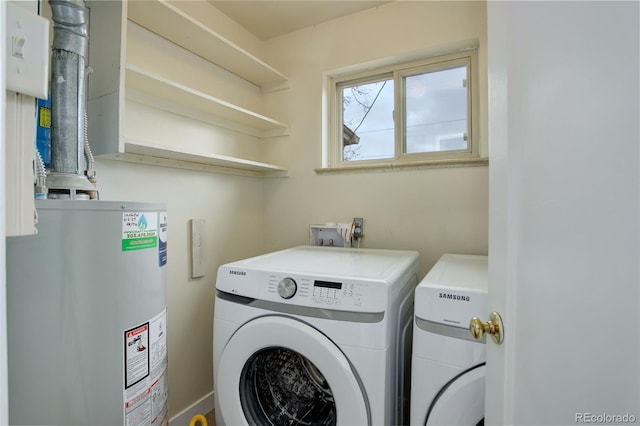 laundry area featuring gas water heater and independent washer and dryer