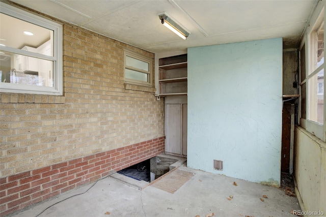 interior space with brick wall