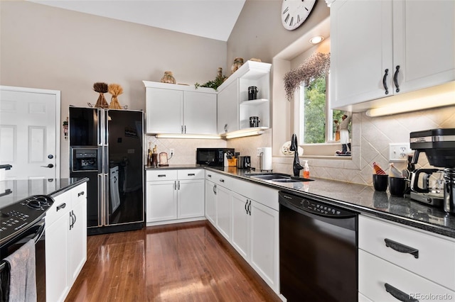 kitchen featuring white cabinetry, a sink, black appliances, and open shelves