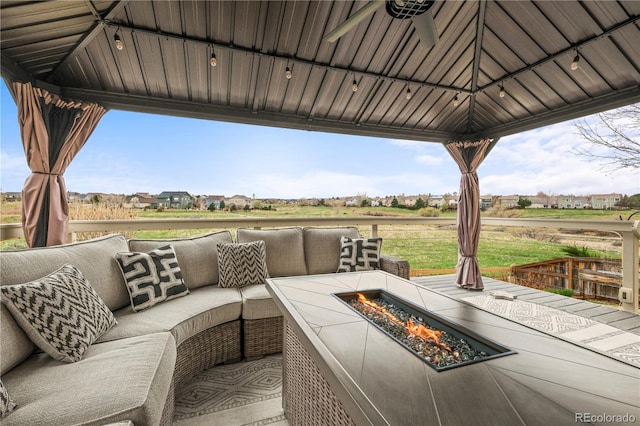 5049 Heatherglen Dr, Highlands Ranch, CO 80130 - view of patio featuring an outdoor living space with a fire pit and a gazebo