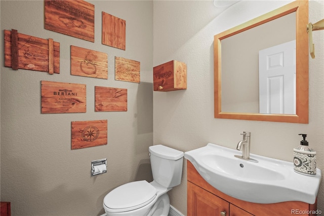 5049 Heatherglen Dr, Highlands Ranch, CO 80130 - bathroom with vanity, toilet, and baseboards