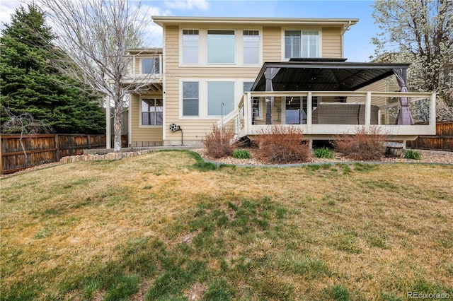 5049 Heatherglen Dr, Highlands Ranch, CO 80130 - back of property featuring a wooden deck