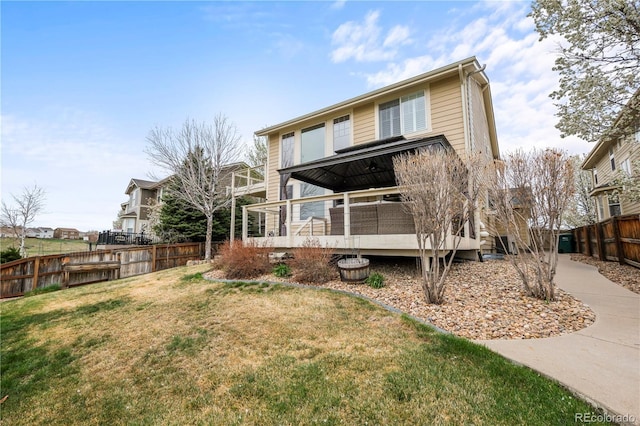 5049 Heatherglen Dr, Highlands Ranch, CO 80130 - rear view of property featuring a wooden deck