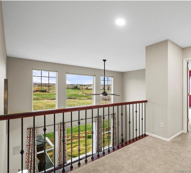 5049 Heatherglen Dr, Highlands Ranch, CO 80130 - hall with plenty of natural light, baseboards, carpet, and recessed lighting