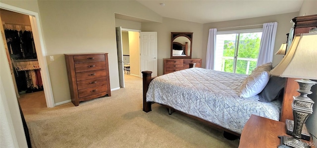 5049 Heatherglen Dr, Highlands Ranch, CO 80130 - bedroom with light carpet, lofted ceiling, and baseboards