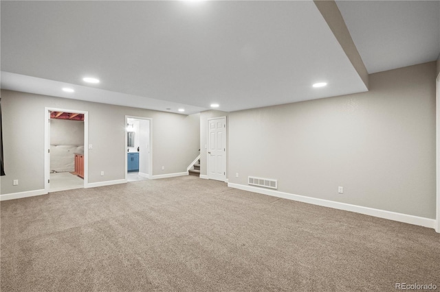 5049 Heatherglen Dr, Highlands Ranch, CO 80130 - finished basement featuring recessed lighting, carpet flooring, stairs, and baseboards