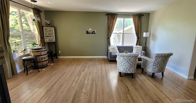 5049 Heatherglen Dr, Highlands Ranch, CO 80130 - sitting room with wood finished floors and baseboards