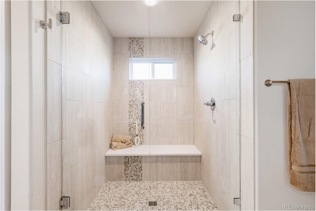 bathroom with an enclosed shower