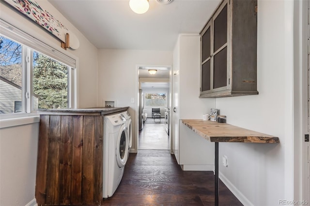 laundry room featuring laundry area, hookup for a washing machine, baseboards, and dark wood-style flooring