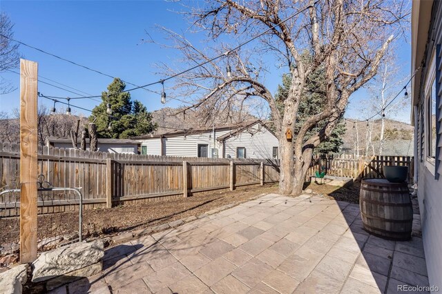 view of patio / terrace featuring a fenced backyard