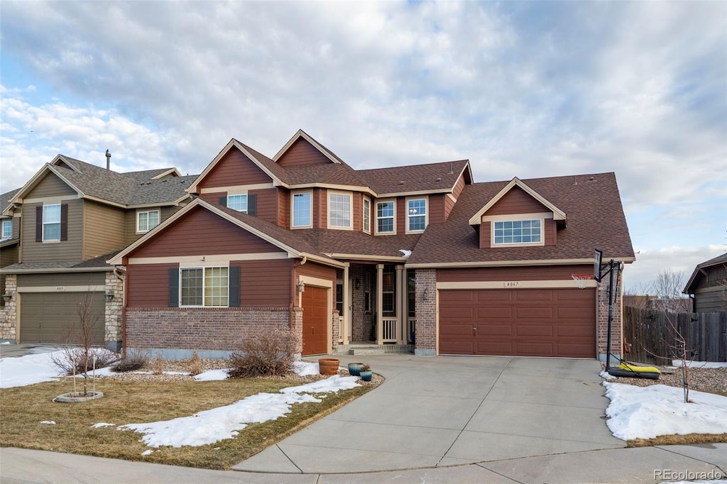 craftsman inspired home with a garage