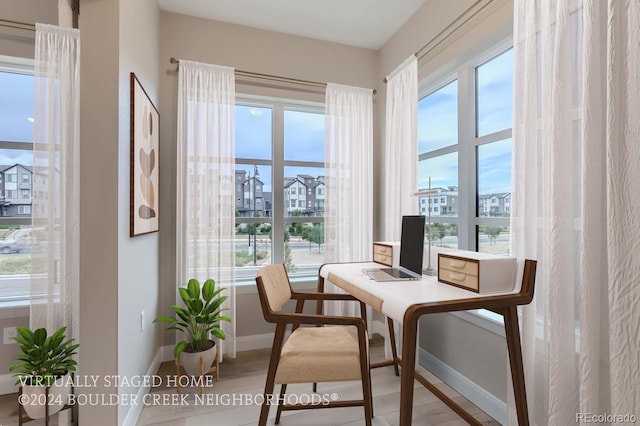 dining room featuring plenty of natural light