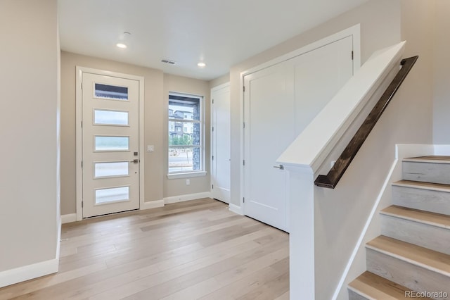 entrance foyer with light wood-type flooring