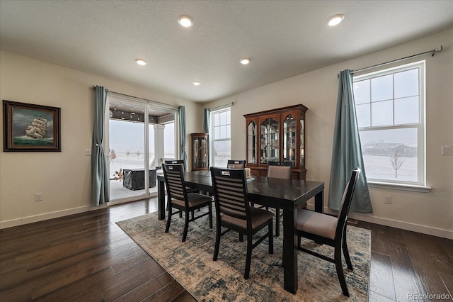 dining area featuring dark wood-style floors, recessed lighting, and baseboards