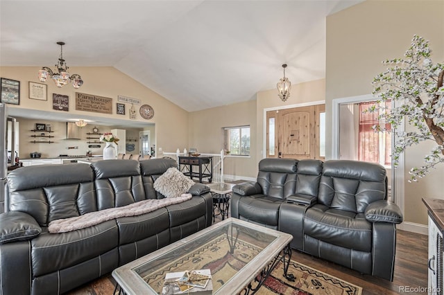 42313 Vista Rdg, Parker, CO 80138 - living area with a chandelier, dark wood finished floors, and high vaulted ceiling