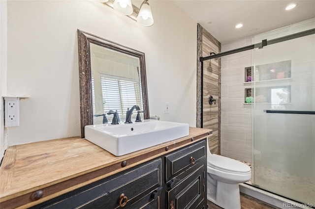 42313 Vista Rdg, Parker, CO 80138 - full bath with vanity, a shower stall, and recessed lighting