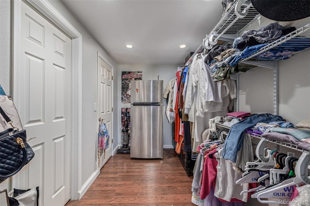 42313 Vista Rdg, Parker, CO 80138 - spacious closet featuring wood finished floors