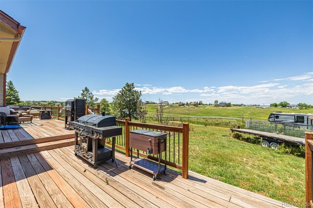 42313 Vista Rdg, Parker, CO 80138 - wooden deck with area for grilling and a rural view