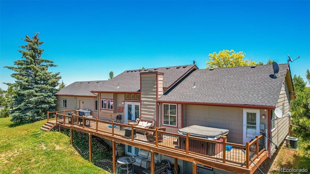 42313 Vista Rdg, Parker, CO 80138 - back of house with roof with shingles, a wooden deck, a yard, a chimney, and french doors