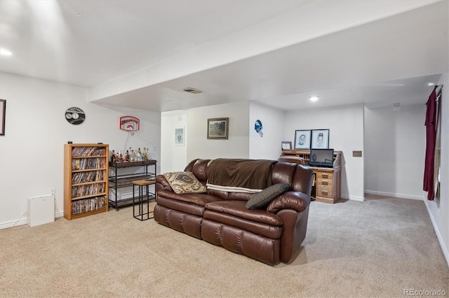11337 E 1st Ave, Aurora, CO 80010 - living area featuring light colored carpet, recessed lighting, and baseboards