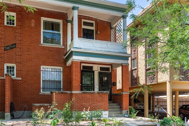 view of front of house with brick siding