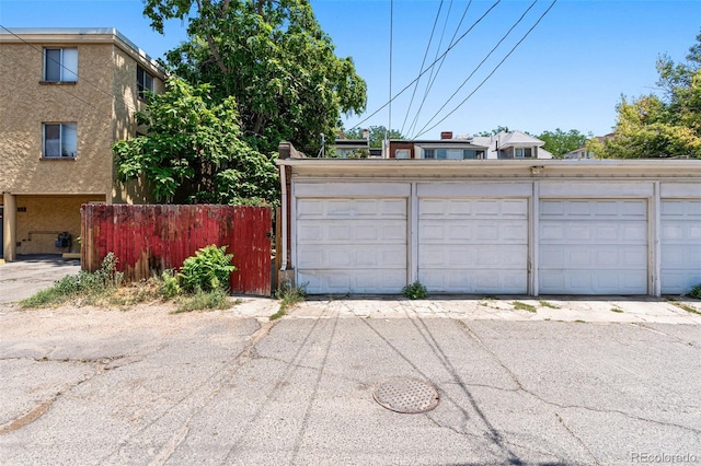 garage with fence