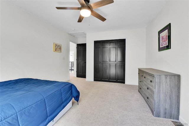 11209 Quivas Loop, Westminster, CO 80234 - bedroom with light colored carpet, a ceiling fan, a closet, and baseboards