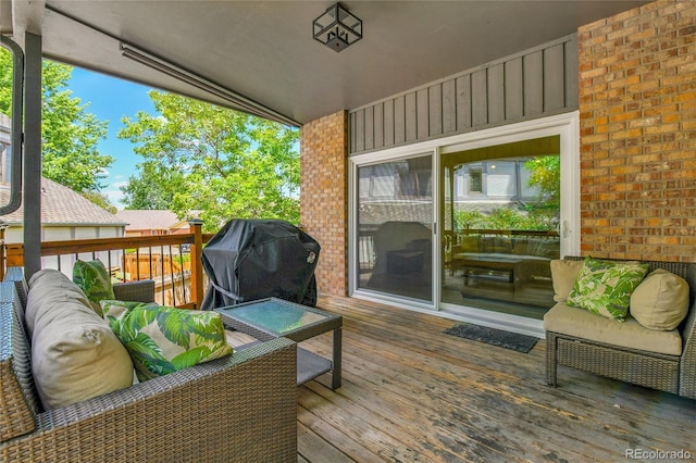 11209 Quivas Loop, Westminster, CO 80234 - wooden terrace with area for grilling and outdoor lounge area