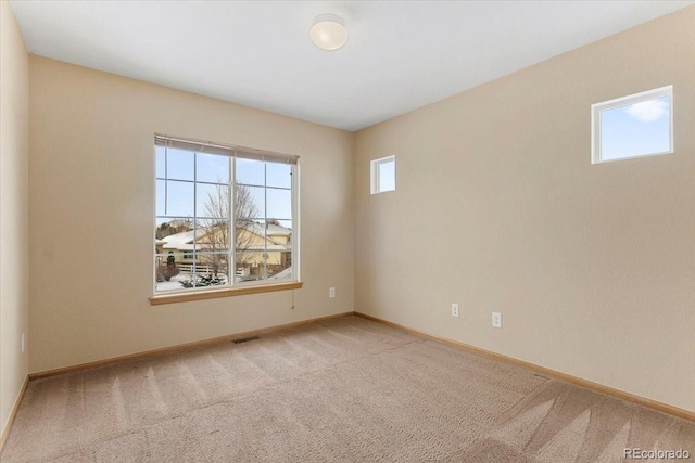 view of carpeted spare room