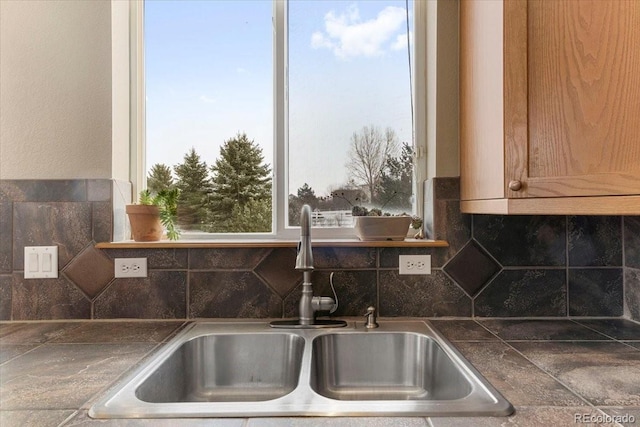 details with tasteful backsplash and a sink