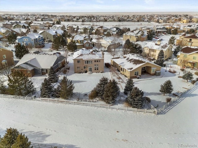 birds eye view of property with a residential view