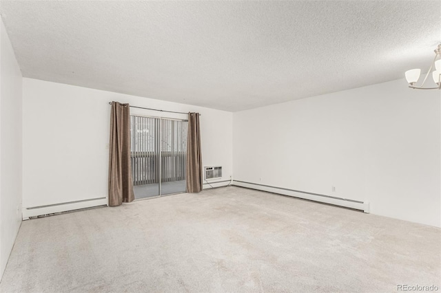 carpeted empty room with a chandelier, a wall mounted air conditioner, a textured ceiling, and baseboard heating