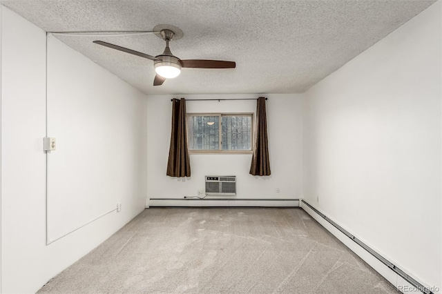 carpeted spare room with ceiling fan, a textured ceiling, a wall mounted AC, and baseboard heating