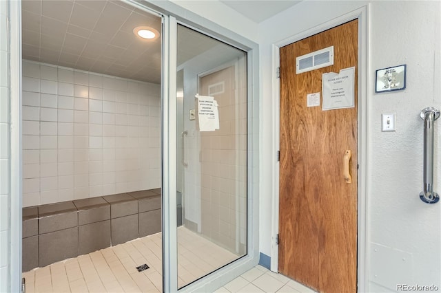 bathroom with tile patterned flooring