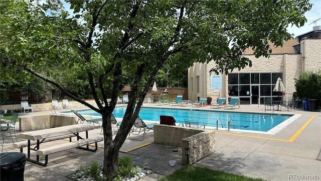 view of pool with a patio area