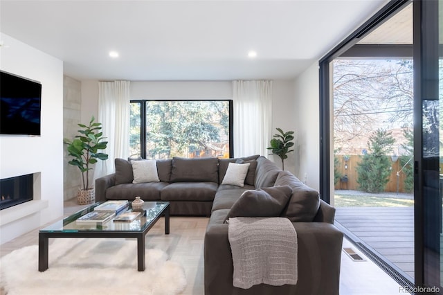 living room with light parquet flooring