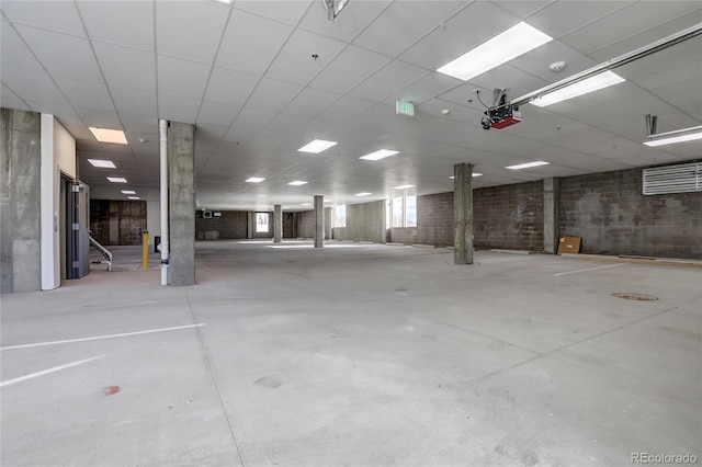 parking deck featuring a garage door opener