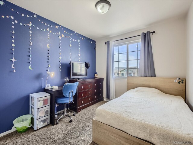 bedroom featuring carpet flooring