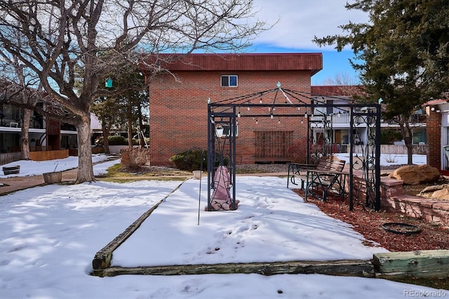 view of yard layered in snow