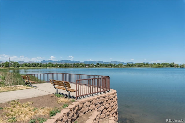 dock area featuring a water and mountain view