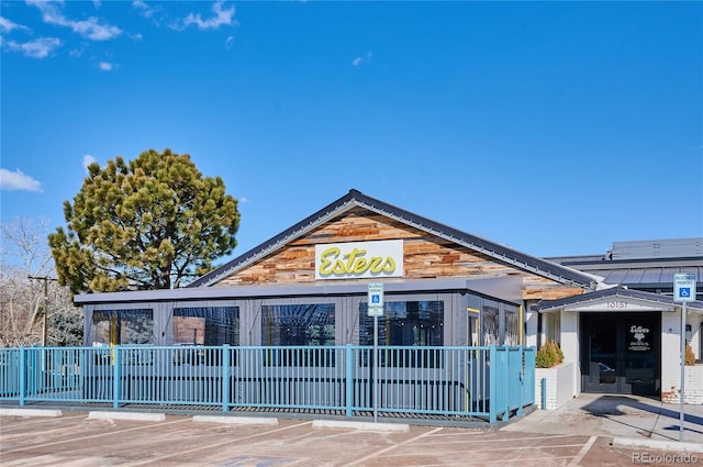 view of front of property with fence