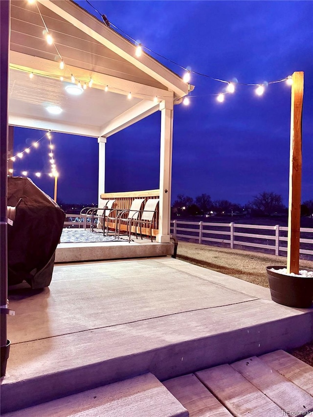 view of patio at twilight