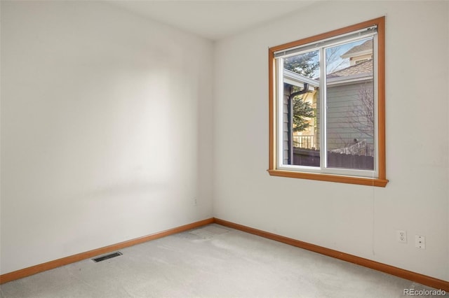 view of carpeted spare room